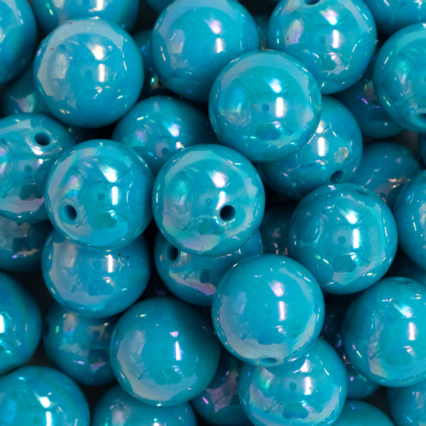 close up view of a pile of 20mm Ocean Blue Solid AB Bubblegum Beads