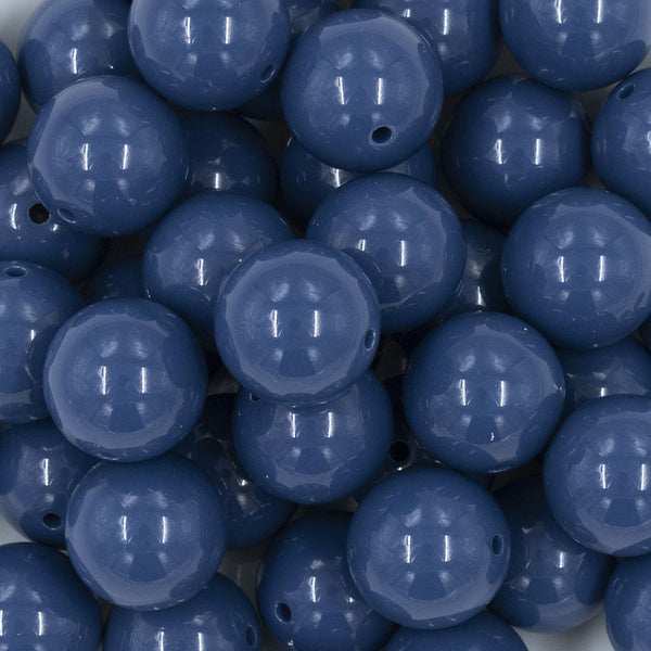 Close up view of a pile of 20mm Blueberry Solid Bubblegum Beads