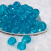 Front view of a pile of 20mm Blue Transparent Disco Faceted Pearl Bubblegum Beads