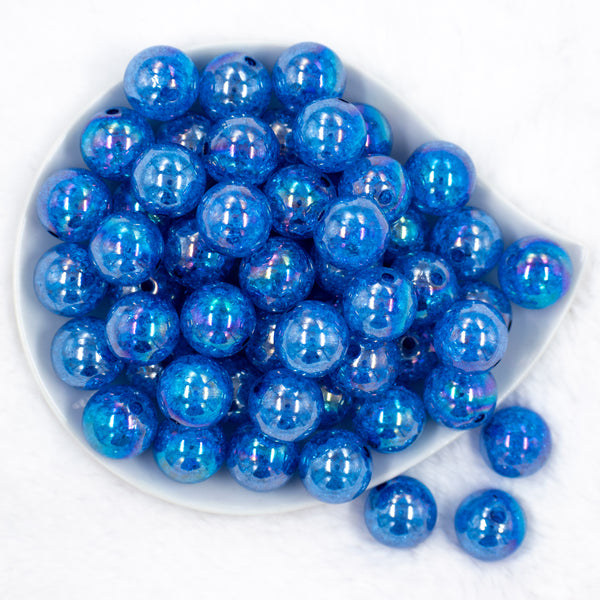 top pile of a pile of 20mm Blue Crackle AB Bubblegum Beads