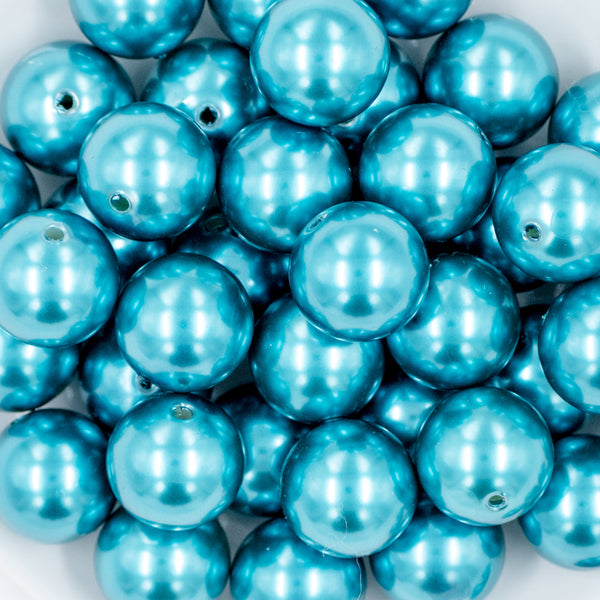close-up view of a plate holding a pile of 20mm Blue Faux Pearl Finish Chunky Acrylic Bubblegum Beads