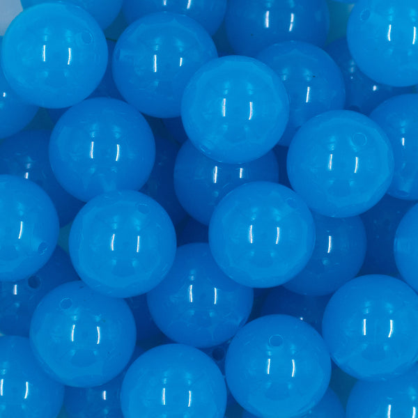 Close up view of a pile of 20mm Bright Blue 