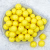 Top view of a pile of 20mm Bright Yellow Solid Acrylic Chunky Bubblegum Beads