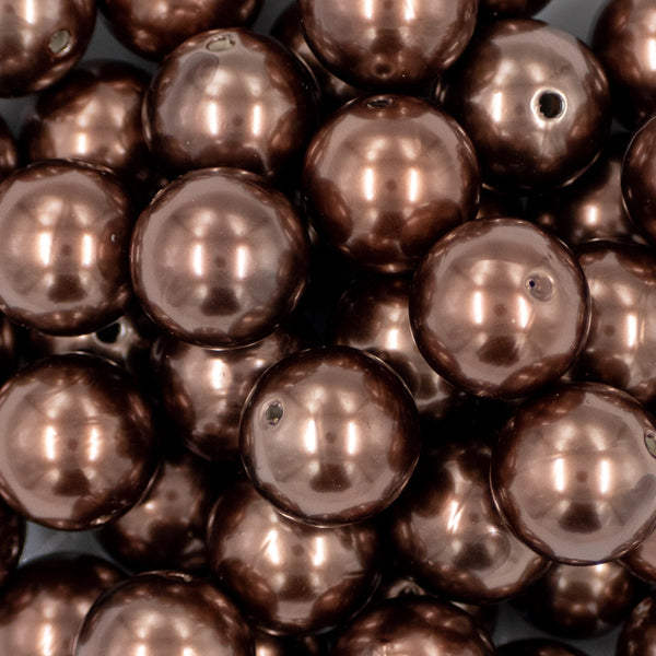 Close up view of a pile of 20mm Brown Faux Pearl Chunky Acrylic Bubblegum Beads