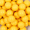 close up view of a pile of 20mm Butter Yellow Solid Chunky Bubblegum Beads