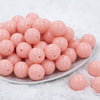 Front view of a pile of 20mm Carnation Pink Solid Acrylic Chunky Bubblegum Beads