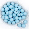 top view of 20mm Carolina Blue Chunky Bubblegum Beads in white dish