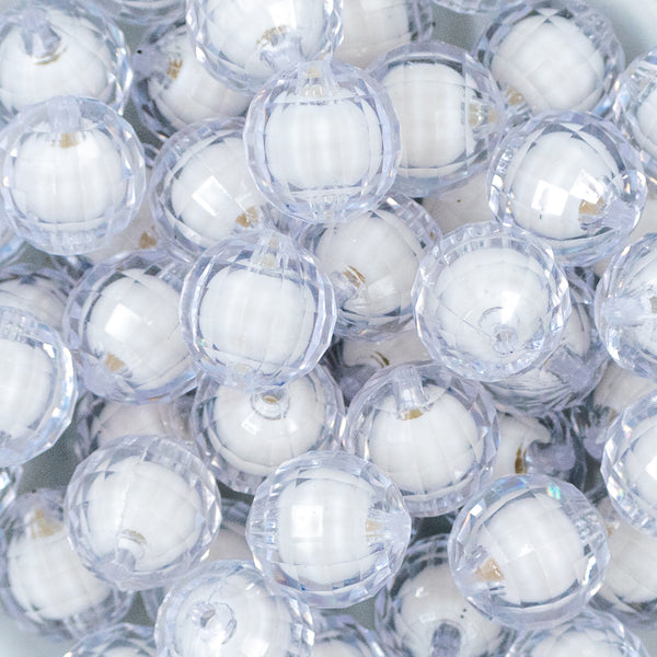 Close up view of a pile of 20mm Clear Translucent Faceted Bead in a bead, chunky acrylic bubblegum Beads
