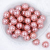 top view of a stack of 20mm Coral Pink Faux Pearl Acrylic Bubblegum Beads