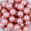 zoomed view of a stack of 20mm Coral Pink Faux Pearl Acrylic Bubblegum Beads