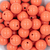 close up view of 20mm Coral Orange Bubblegum Beads on white background