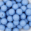 close up view of a pile of 20mm Solid Cornflower Blue Bubblegum Beads