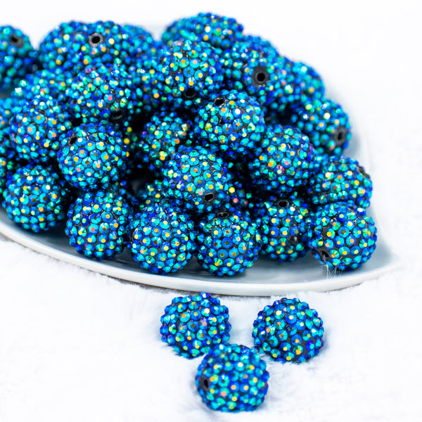Front view of a pile of 20mm Cosmic Blue Rhinestone AB Bubblegum Beads