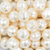 close-up view of a pile of 20mm Ivory / Cream Disco Faceted Pearl Chunky Bubblegum Beads