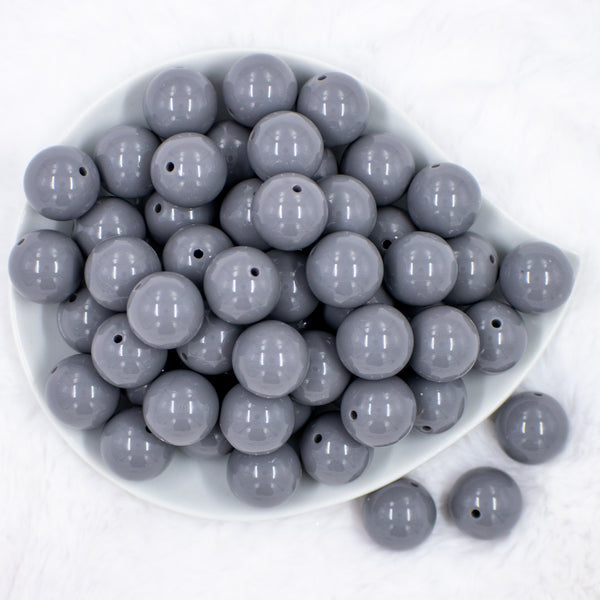 top view of a pile of 20mm Dark Gray Solid Bubblegum Beads