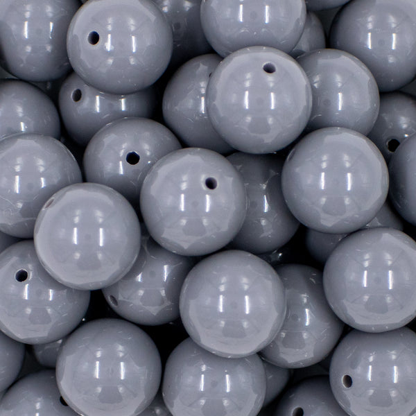 close up view of a pile of 20mm Dark Gray Solid Bubblegum Beads