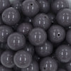 Close up view of a pile of 20mm Charcoal Gray Solid Chunky Acrylic Bubblegum Beads