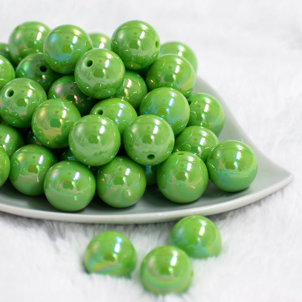 Front view of a pile of 20mm Green Solid AB Bubblegum Beads