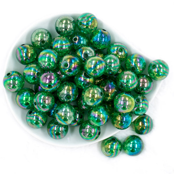 top pile of a pile of 20mm Dark Green Crackle AB Bubblegum Beads