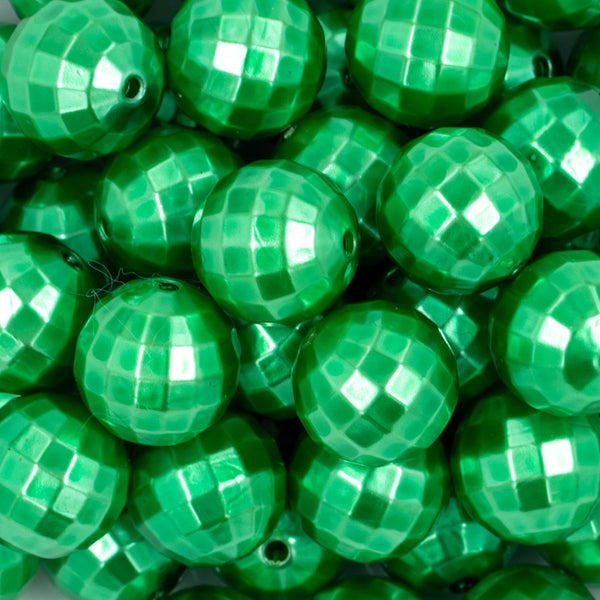 close-up view of a pile of 20mm Dark Green Disco Faceted Pearl Bubblegum Beads