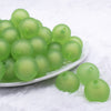 front view of a pile of 20mm Green Frosted Bubblegum Beads