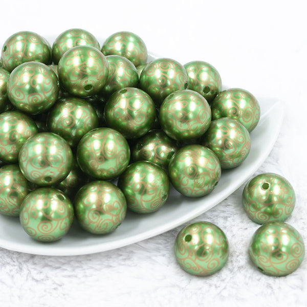 Front view of a pile of 20mm Green with Gold Filigree Printed Acrylic Bubblegum Beads