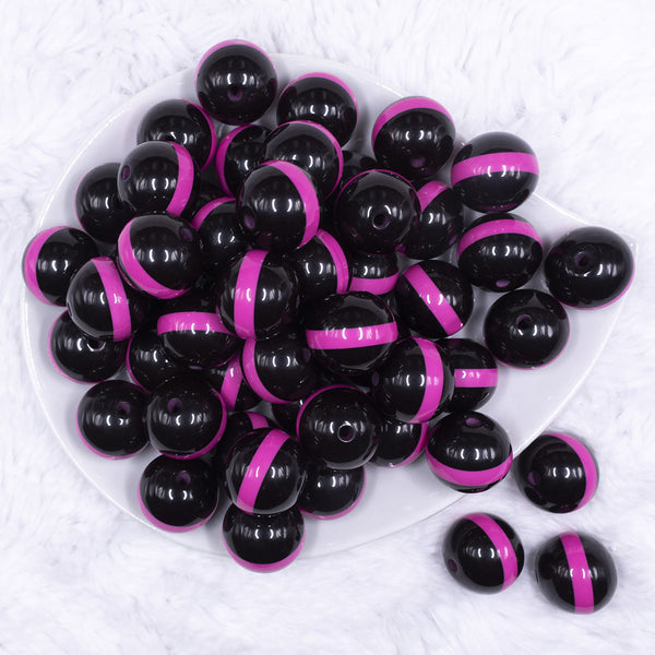 top view of a pile of 20mm Hot Pink Band on Black Bubblegum Beads