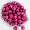 Top view of a pile of 20mm Hot Pink Solid AB Bubblegum Beads