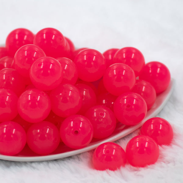 Front view of a pile of 20mm Bright Hot Pink 