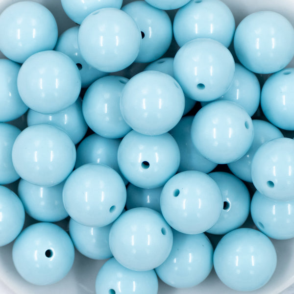 close-up view of a pile of 20mm Ice Blue Solid Chunky Bubblegum Beads