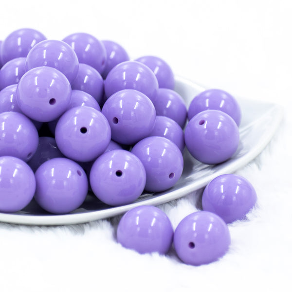 top view of a pile of 20mm Iris Purple Solid Chunky Bubblegum Beads