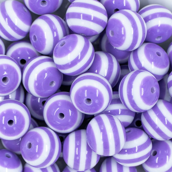 close-up view of a pile of 20mm Iris Purple with White Stripes Bubblegum Beads