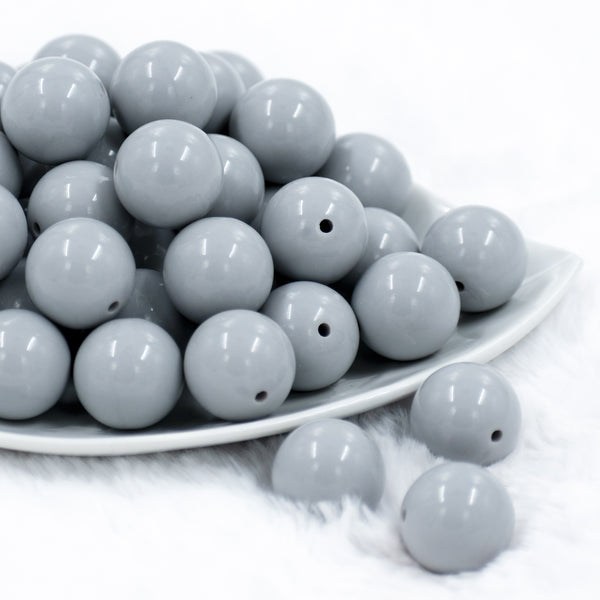 front of a pile of 20mm Light Gray Solid Bubblegum Beads