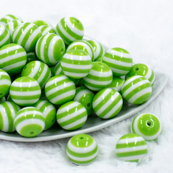 front view of a pile of 20mm Green with White Stripes Chunky Bubblegum Beads