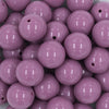 Close up view of a pile of 20mm Lilac Purple Solid Chunky Acrylic Bubblegum Beads