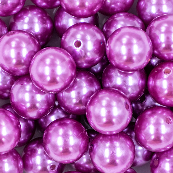 Close up view of a pile of 20mm Lilac Purple Faux Pearl Acrylic Chunky Bubblegum Beads