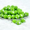 front of a pile of 20mm Lime Green with White Hearts Bubblegum Beads