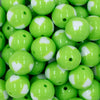 close up of a pile of 20mm Lime Green with White Hearts Bubblegum Beads