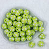 top of a pile of 20mm Lime Green with White Polka Dots Bubblegum Beads