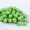 front of a pile of 20mm Lime Green Disco Faceted Pearl Bubblegum Beads