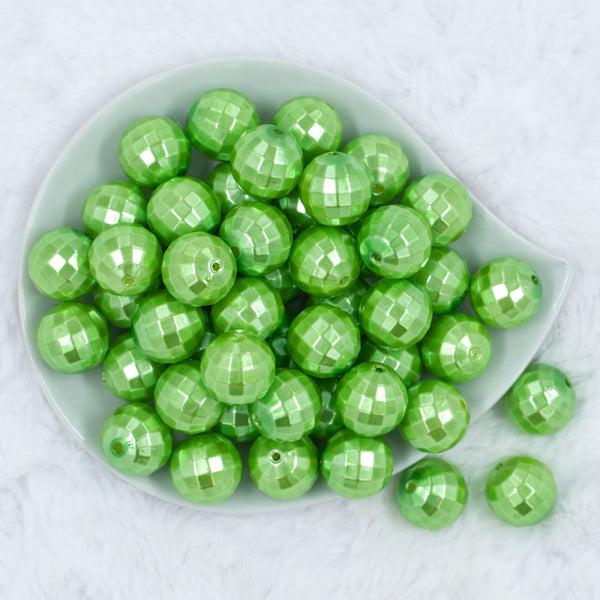 top of a pile of 20mm Lime Green Disco Faceted Pearl Bubblegum Beads