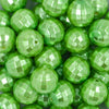 close up of a pile of 20mm Lime Green Disco Faceted Pearl Bubblegum Beads