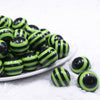 front view of a pile of 20mm Lime Green Stripes on Black Chunky Bubblegum Jewelry Beads
