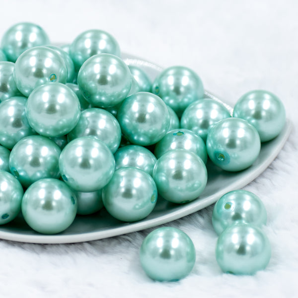front of a pile of 20mm Mint Green Faux Pearl Bubblegum Beads