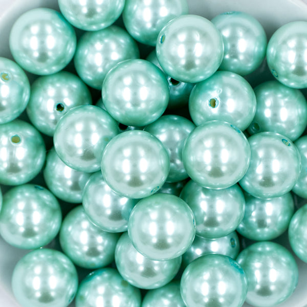 close up of a pile of 20mm Mint Green Faux Pearl Bubblegum Beads