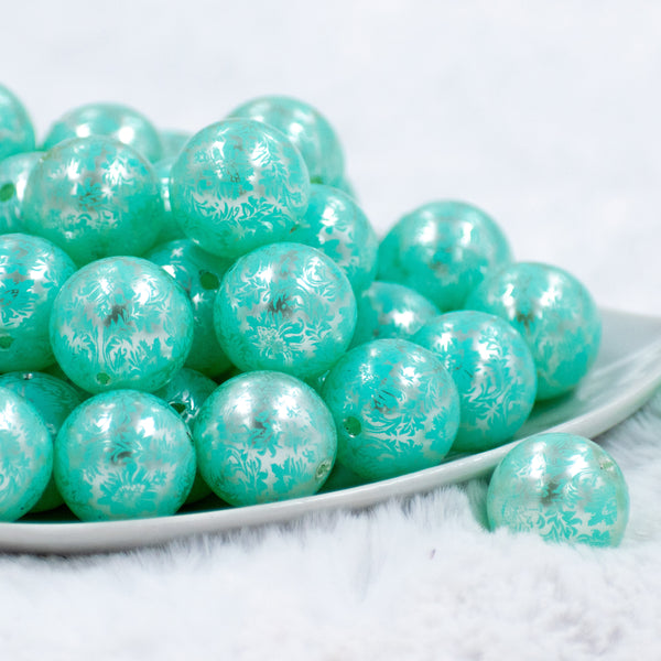 front of a pile of 20mm Mint Green Lace Bubblegum Beads