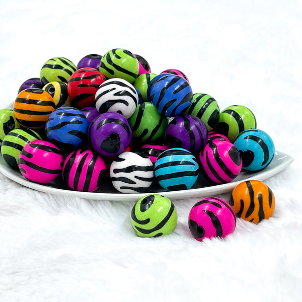 front of a pile of 20mm Multi-Colored Zebra Animal Print Bubblegum Beads