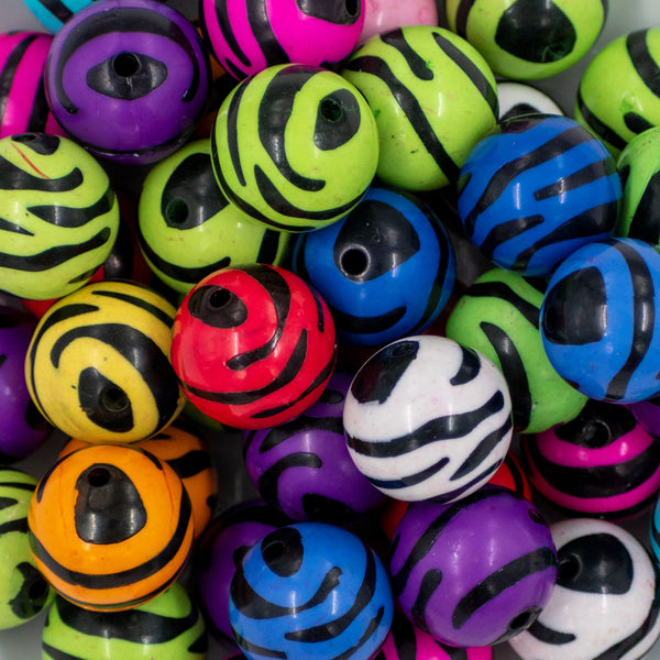close up of a pile of 20mm Multi-Colored Zebra Animal Print Bubblegum Beads
