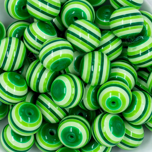 close up view of a pile of 20mm Multi Green Stripe Bubblegum Beads