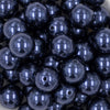 Close up view of a pile of 20mm Navy Blue Faux Pearl Chunky Acrylic Bubblegum Beads